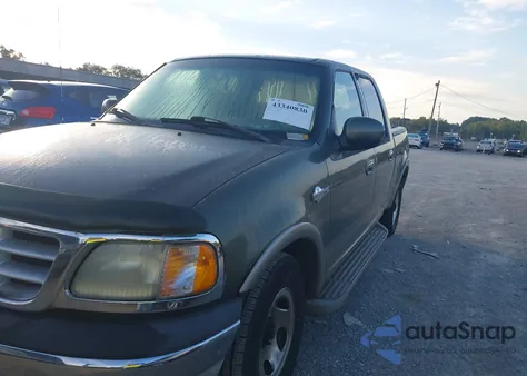 2002 Ford F-150 Lariat/Xlt z USA, uszkodzony, nr VIN 1FTRW07LX2KA56458